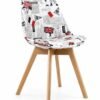 Newspaper print fabric accent chair with curved backrest and wooden legs