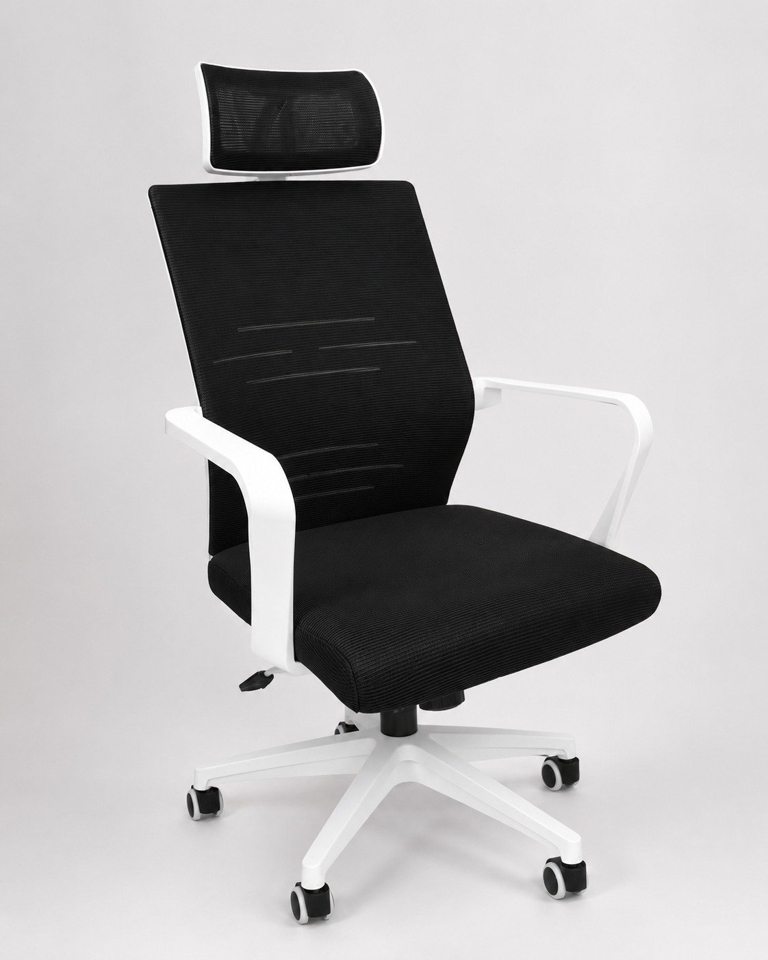 Black and white mesh ergonomic office chair with adjustable headrest