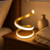 Modern gold spiral LED table lamp with white light