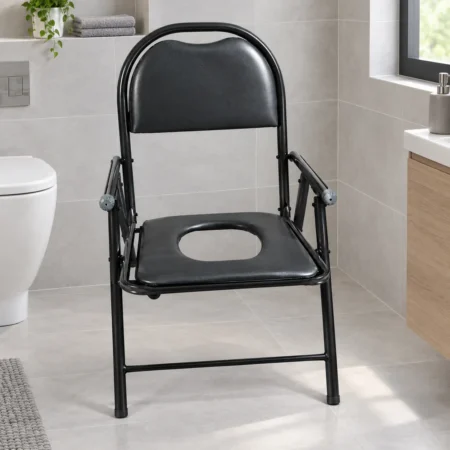 Folding commode chair with padded seat and armrests